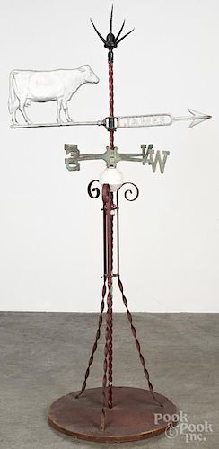 James swell-body zinc cow weathervane, 19th c., with a milk glass lightning ball and stand