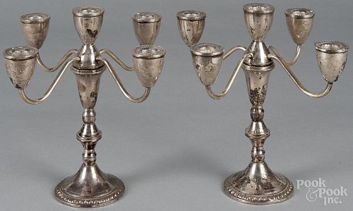 Pair of Duchin weighted sterling silver candelabra, 9 1/4'' h.