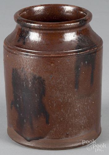 Pennsylvania redware jar, 19th c., with manganese splotching, 6'' h.