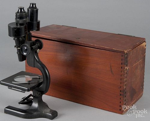 Spencer microscope, 20th c., in a fitted case, 15'' h.