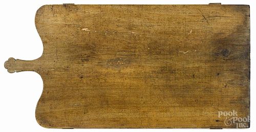 Large Continental pie board, 19th c., 36 1/2'' h., 18 1/4'' w.