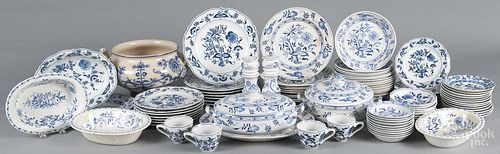 Ninety pieces of Meissen style blue and white dinnerware in the Blue Onion pattern, largely English