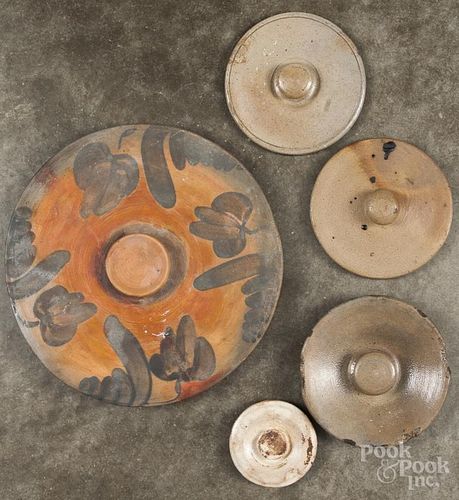 Five stoneware crock lids, 19th c., largest - 10 1/4'' dia.
