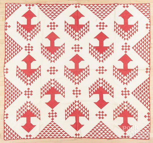 Pieced quilt, late 19th c., in a red and white Pine Tree pattern, 73'' x 80''.