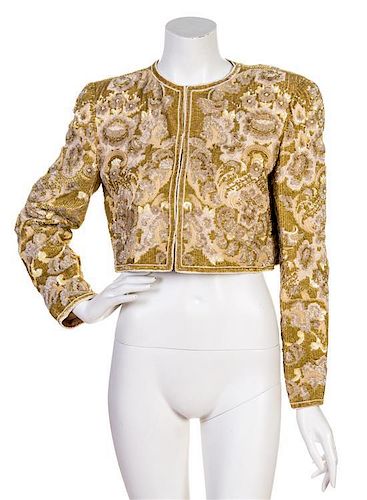 * A Bill Blass Gold Sequin Bolero, Size 10.