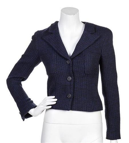 * A Chanel Black and Blue Tweed Jacket, Size 36.