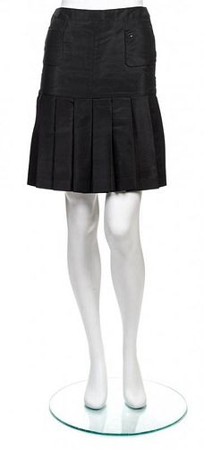 * A Chanel Black Silk Pleated Skirt, Size 34.