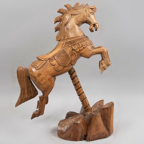 Figura ecuestre. Siglo XX. Elaborada en madera tallada y entintada. 52 x 46 x 20 cm