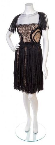 * A Marchesa Black Sequin Dress, Size 4.