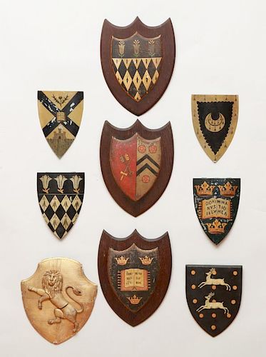 MISCELLANEOUS GROUP OF PAINTED WOOD, TIN AND GILTWOOD COAT-OF-ARMS