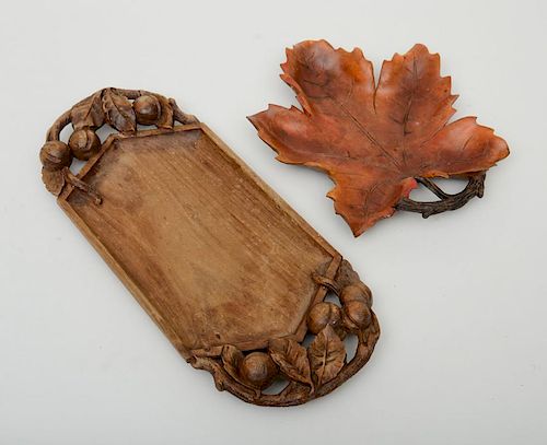 TWO CARVED WOODEN TRAYS