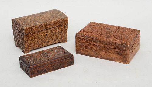 GROUP OF THREE CARVED HARDWOOD BOXES