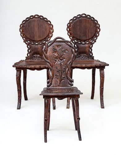 PAIR OF VICTORIAN CARVED WALNUT SIDE CHAIRS, IN THE BLACK FOREST TASTE