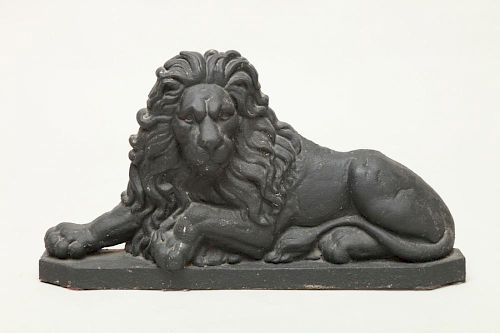 ENGLISH CAST-IRON MODEL OF A RECUMBANT LION