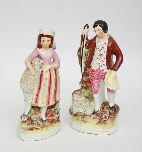 PAIR OF STAFFORDSHIRE POTTERY FIGURAL GROUPS