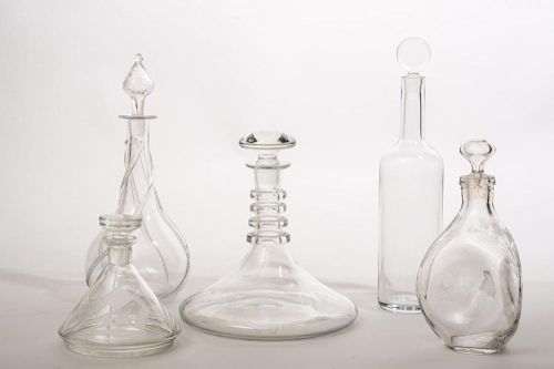 BACARRAT DECANTER, DESINGED BY VAN DAY TRUEX AND A GROUP OF FOUR GLASS DECANTERS WITH STOPPERS