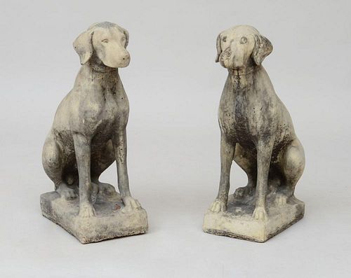 PAIR OF COMPOSITION SEATED DOGS