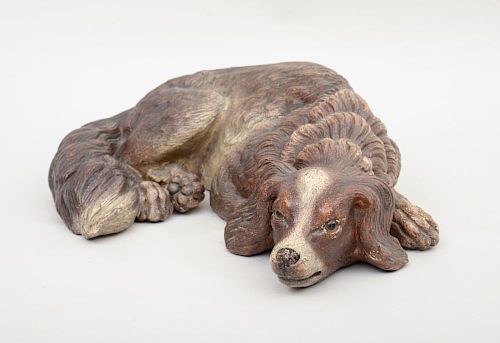 ENGLISH PAINTED COMPOSITION OF A RESTING SPANIEL