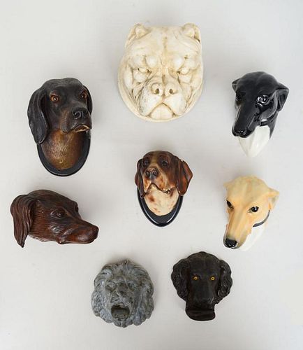 MISCELLANEOUS GROUP OF EIGHT MODELS OF DOG HEADS