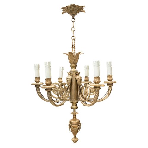 CHANDELIER FRANCE, EARLY 20TH CENTURY In gilded bronze with decoration of acanthus leaves, grapevines, and faces of Bacchus 33.4" (85 cm)