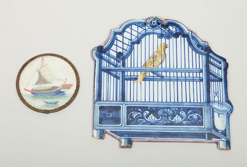 DELFT GLAZED PLAQUE OF A BIRD IN CAGE