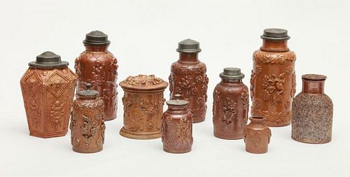 SEVEN CONTINENTAL BROWN-GLAZED STONEWARE JARS WITH PEWTER LIDS, A TEA CADDY, A TOBACCO JAR AND A SMALL JAR