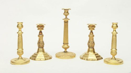 A PAIR OF CHARLES X ORMOLU CANDLESTICKS AND A SINGLE CHARLES X ORMOLU CANDLESTICK
