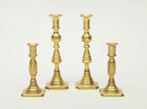 TWO PAIRS OF ENGLISH BRASS CANDLESTICKS