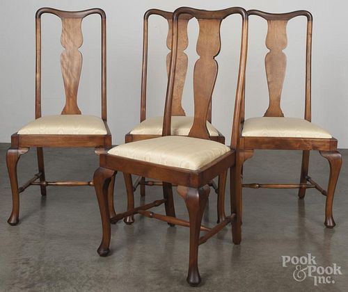 Set of four Queen Anne style maple dining chairs.