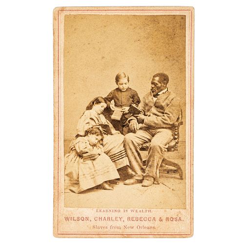 [SLAVERY & ABOLITION] -- [CHINN, Wilson]. PAXSON, Charles, photographer. Learning is Wealth. Wilson, Charley, Rebecca & Rosa. Slaves from New Orleans.