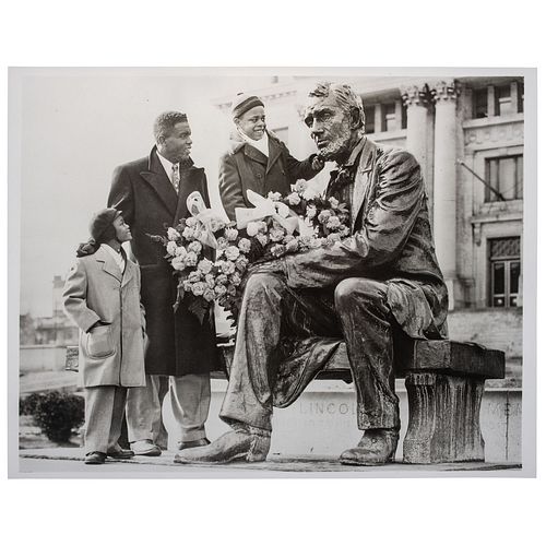 [ROBINSON, Jackie (1919-1972)]. [RUCKER, Mark, photographer.] Silver gelatin photograph of Robinson visiting the Lincoln statue outside of Essex Count