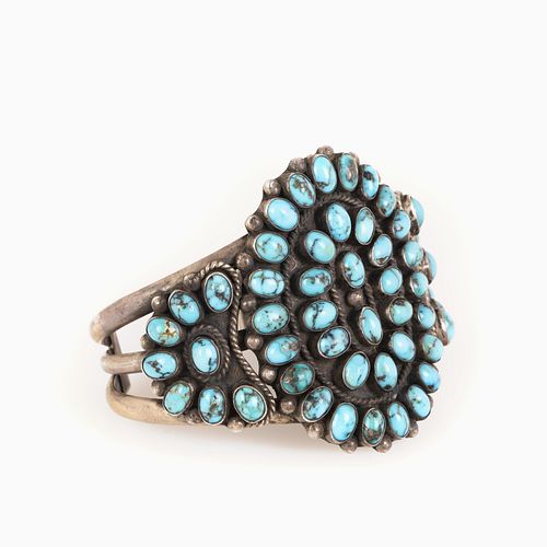 A Navajo Silver and Turquoise Cluster Bracelet, ca. 1950-1960