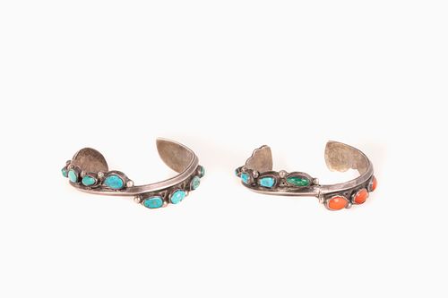 A Pair of Navajo Interlocking Silver, Turquoise and Coral Bracelets