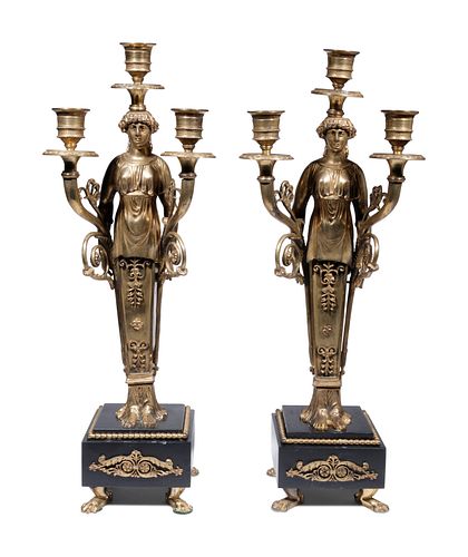A Pair of Empire Style Gilt Bronze Figural Three-Light Candelabra