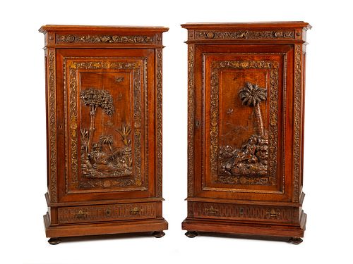 A Pair of French Renaissance Revival Parcel Gilt Cabinets