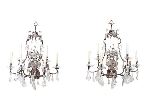 A Pair of Maison Bagues Silvered Metal, Rock Crystal and Glass Six-Light Sconces