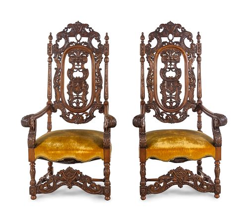 A Pair of Charles II Style Carved Armchairs