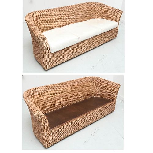 Pair Ralph Lauren style curved woven rattan sofas