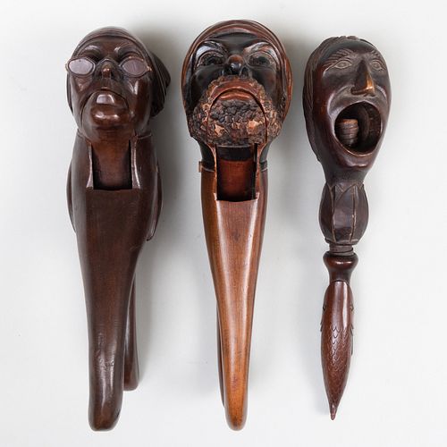 Three Stained and Carved Wood Figural Nutcrackers