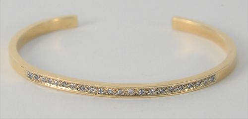 14 Karat Gold Bangle Bracelet, set with diamonds, 14.5 grams.