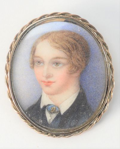 Gold Case Pin, having miniature portrait of a boy inside, length 1 1/4 inches.