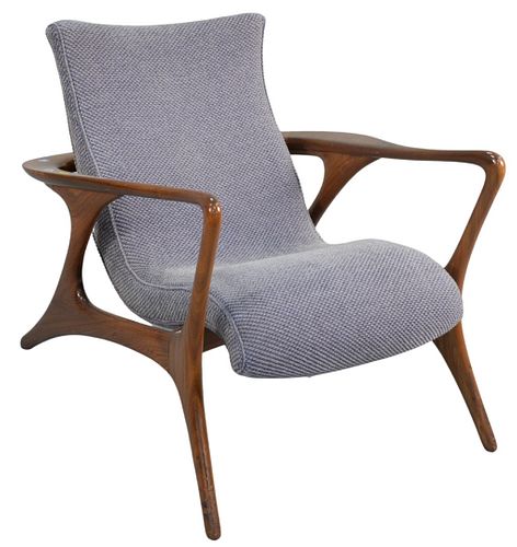 Vladimir Kagan Contour Lounge Chair, with light blue upholstery, height 28 1/2 inches, width 29 1/2 inches, depth 30 1/2 inches. Provenance: The Estat