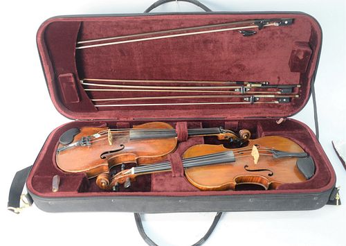 Two Student Violins, together with four bows, one labeled Glasser, one signed Amati Pestini, all encased in one soft shell travel case, case length 33