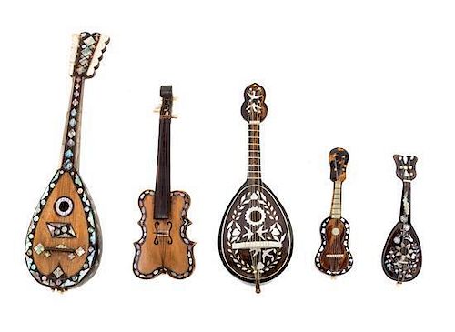 A Group of Five Tortoise Shell and Composite Shell Inlaid Miniature Musical Instruments Length of longest 11 3/4 inches.