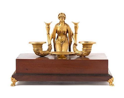 * An Empire Style Gilt Bronze Mounted Mahogany Figural Encrier Length overall 12 inches.