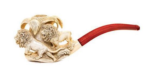 A Carved Meerschaum Pipe Length 10 inches.