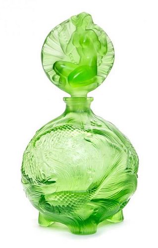 * A Czechoslovakian Molded Glass Perfume Bottle Height 7 1/4 inches.