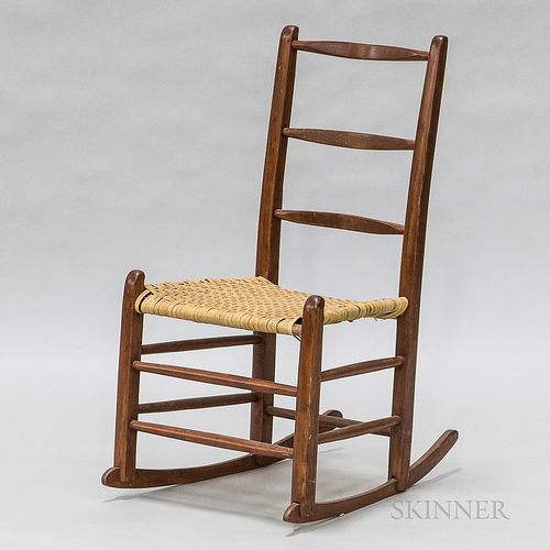 Small Red-stained Rocking Chair