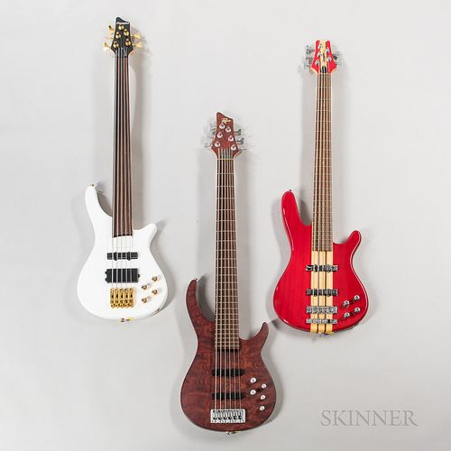 Three Electric Bass Guitars