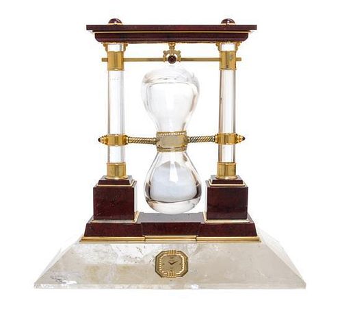 * A French Carved Jasper, Rock Crystal, Diamond and Silver-Gilt Desk Clock Height 12 x width 12 x depth 6 inches.